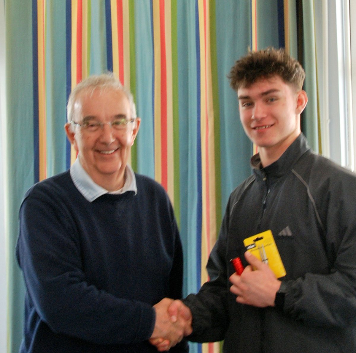 Vlad receiving the junior prize from Peter Mitchell